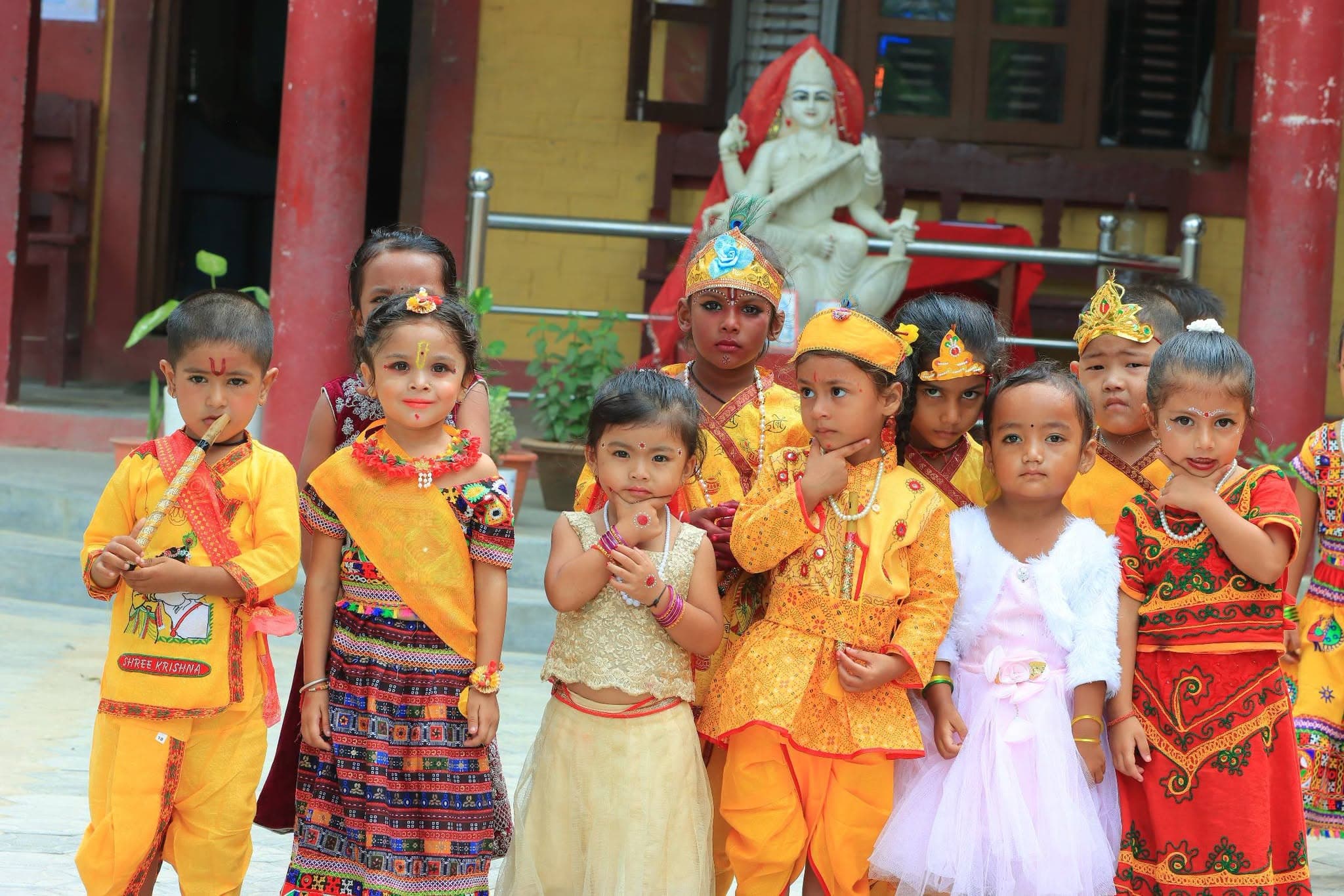 Toddlers celebrating cultural festivals in traditional attire